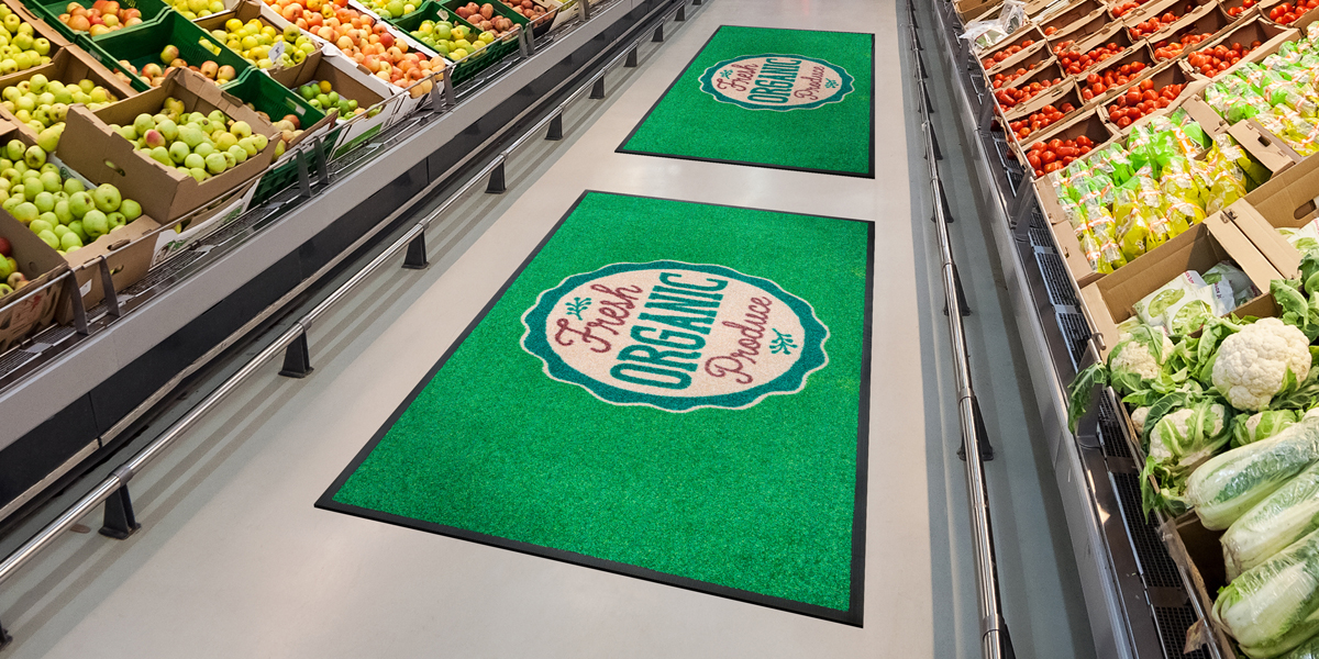 Jet-Print - green Jet-Print mat in the super market advertising the organic food